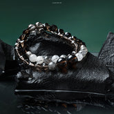 Lumi Reiki Smoky Quartz Energy Stabilizer Bracelet on a Model's Wrist - Stylish Jewelry for Stress Relief and Energy Stability