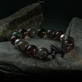 Pulsera de obsidiana con colmillo guardián