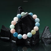 Lumi Reiki Love Morganite Bracelet on a Model's Wrist - Stylish Jewelry for Love Attraction and Stress Relief