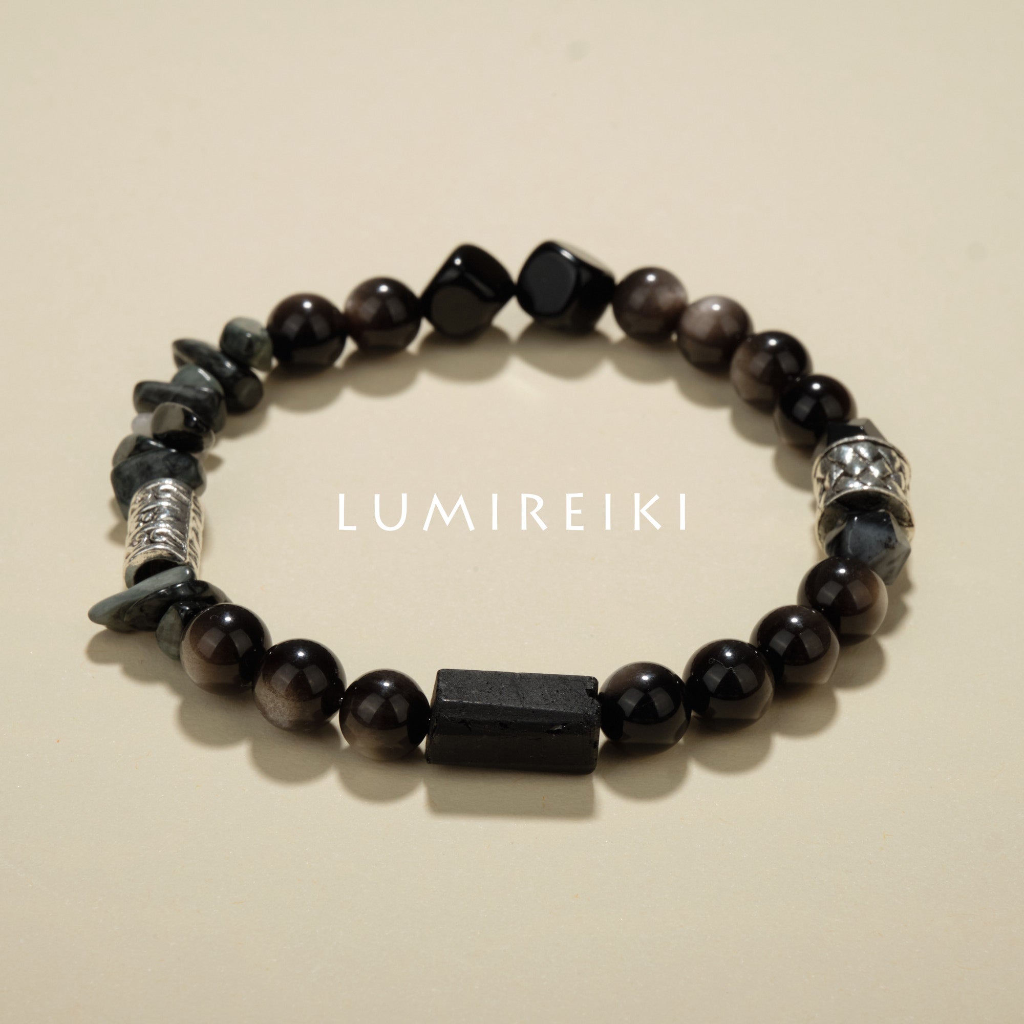 Lumi Reiki Obsidian Bead Close-Up | Purifying Crystal for Energy Field Cleansing & Vitality Boost