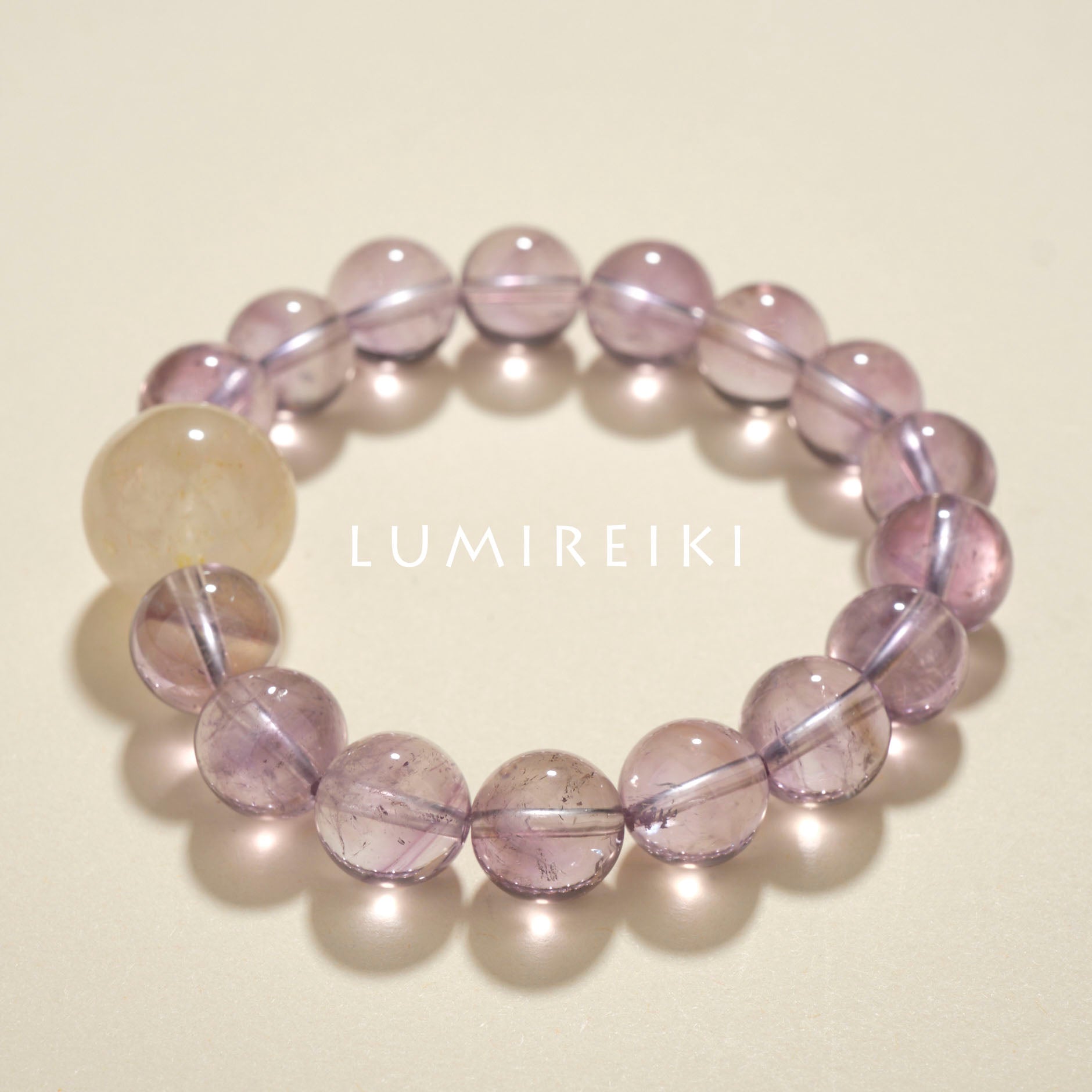 Lumi Reiki Light Purple Crystal Bead Close-Up | Calming Crystal for Anxiety Relief & Creative Spark