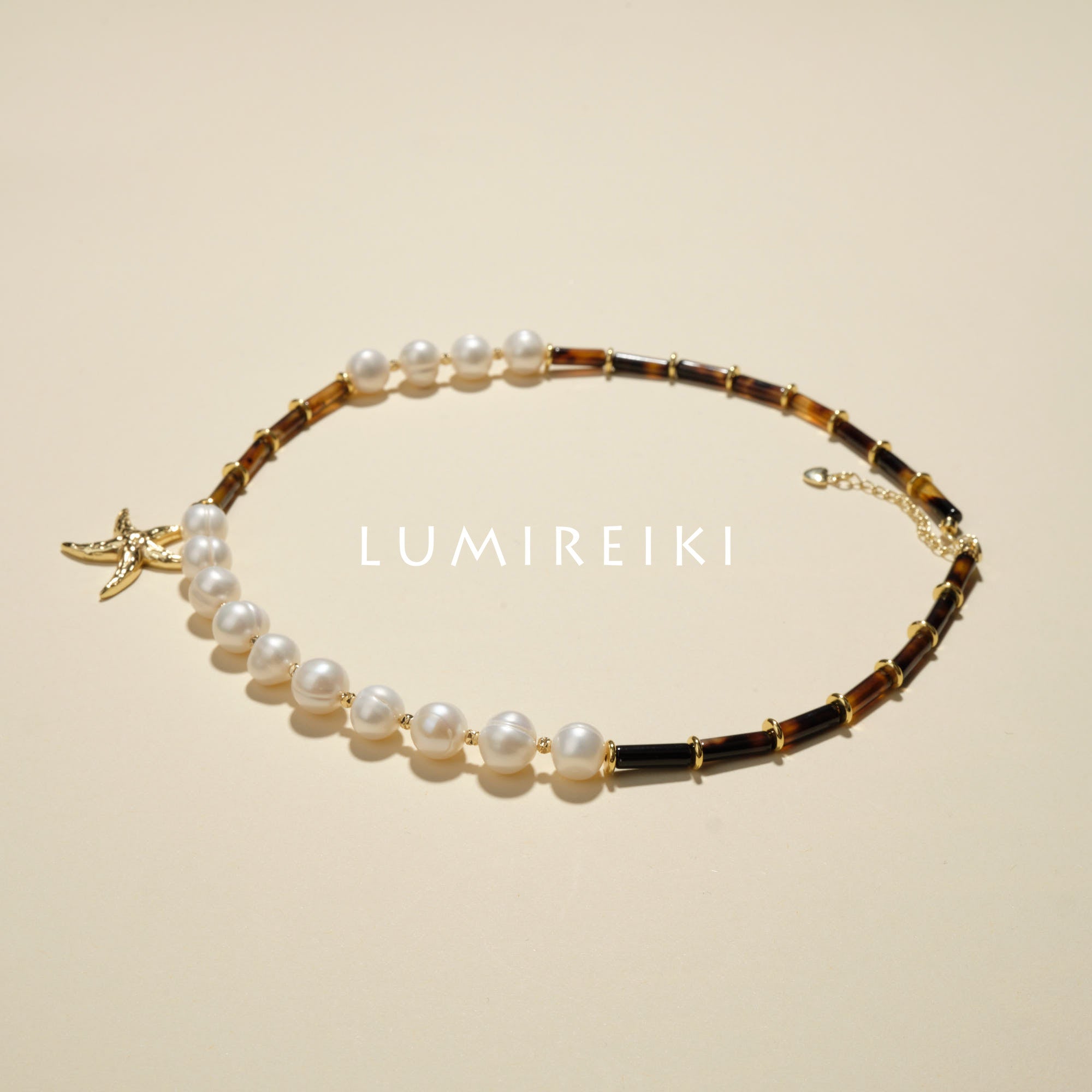 Pearl Tranquil Necklace with 10-11mm pearls and 4x13mm cylinders for elegance, serenity, and aura purification.